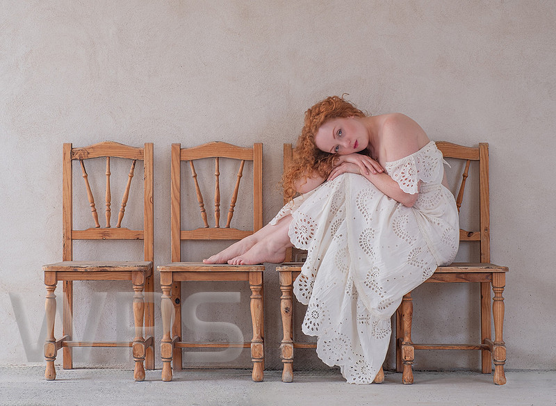 The Lady On The Chairs